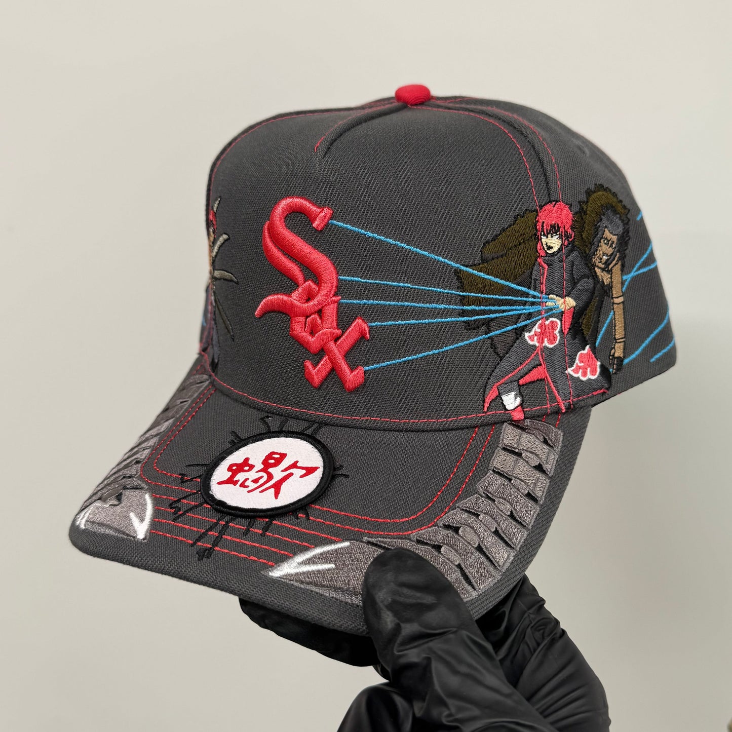 red sand puppet cap