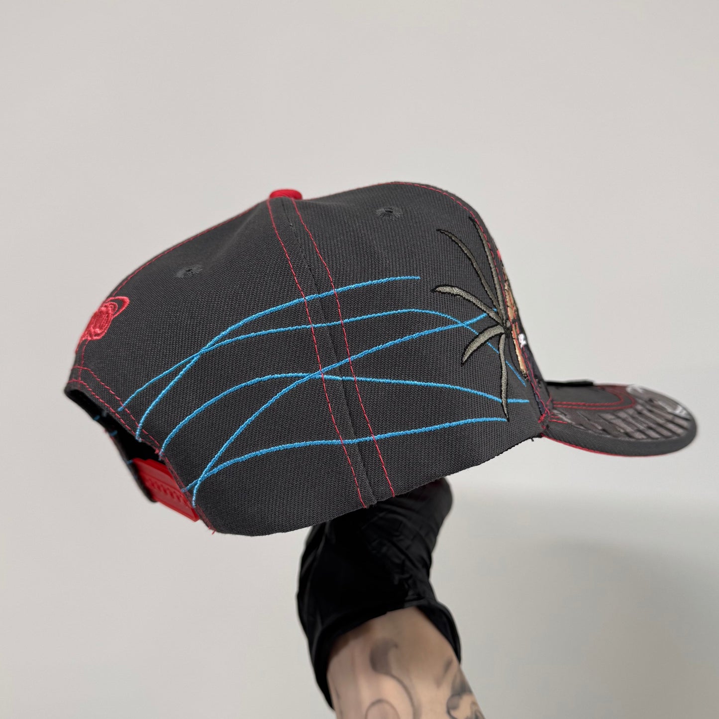 red sand puppet cap