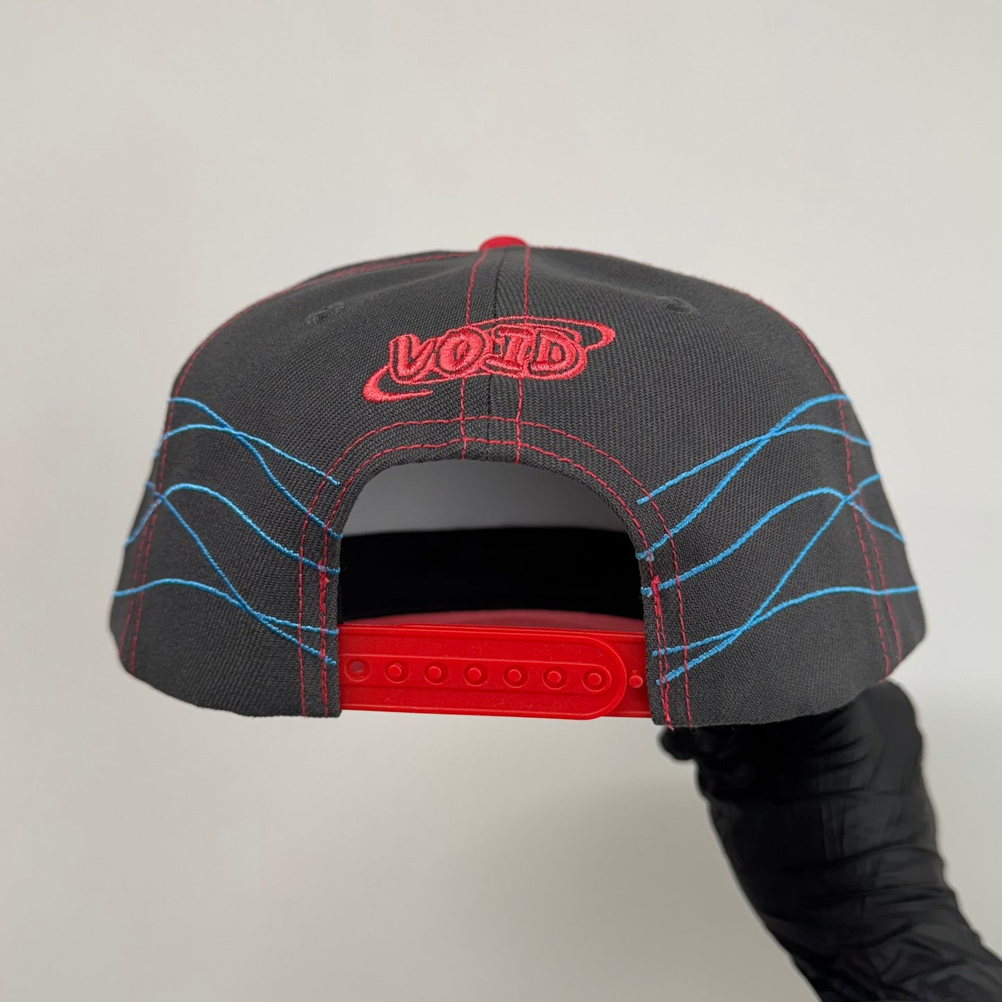 red sand puppet cap