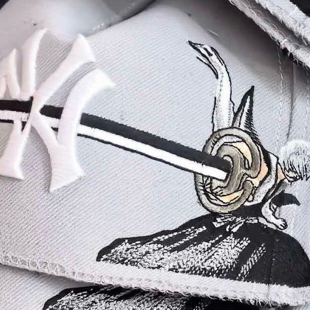 Gin cap embroidery detail