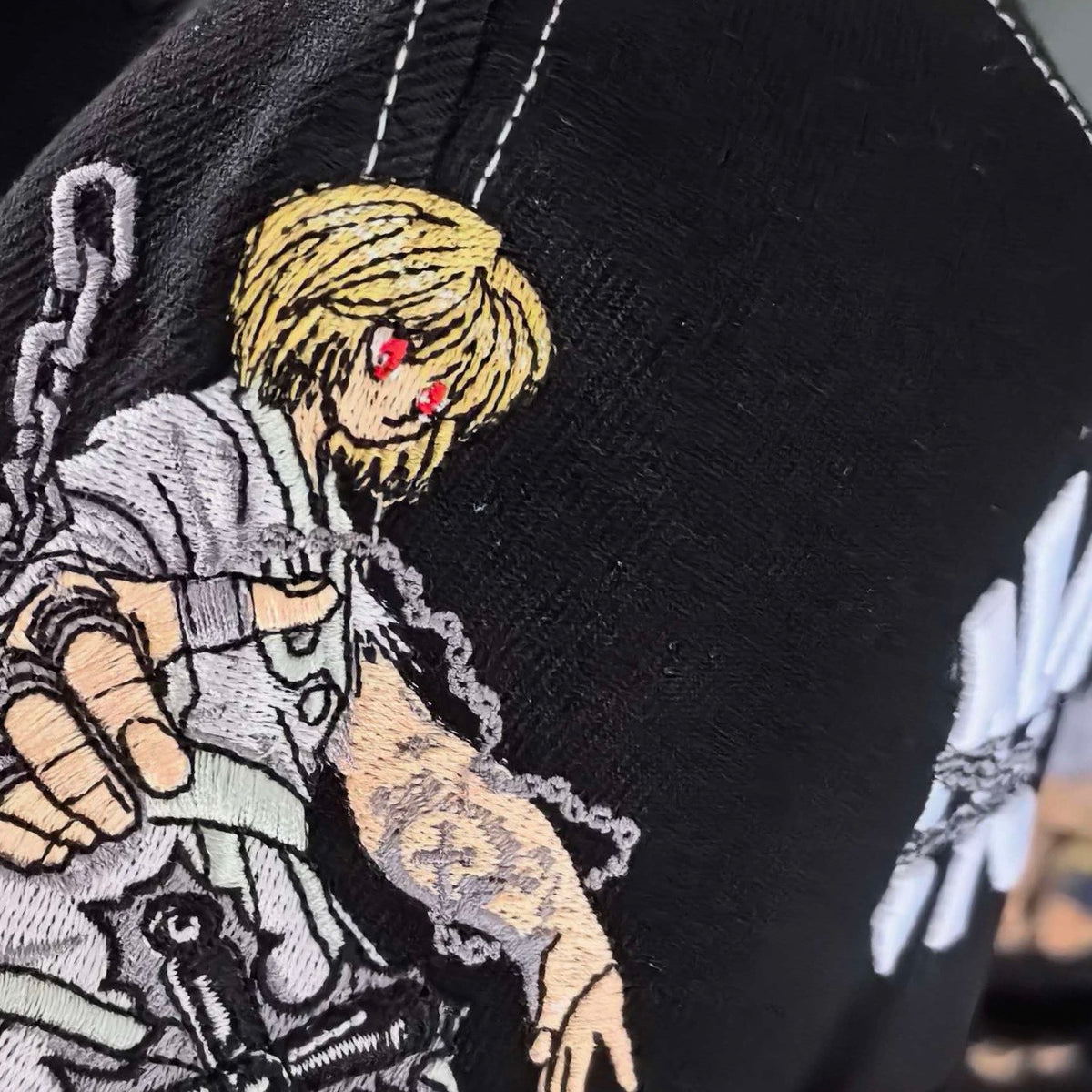 Kurapika cap embroidery detail